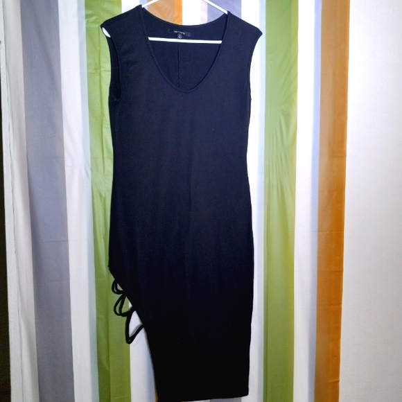 New Look Dresses & Skirts - NEW  LOOK Zero Sleeve Dress size L, Black color with detail on the Leg.